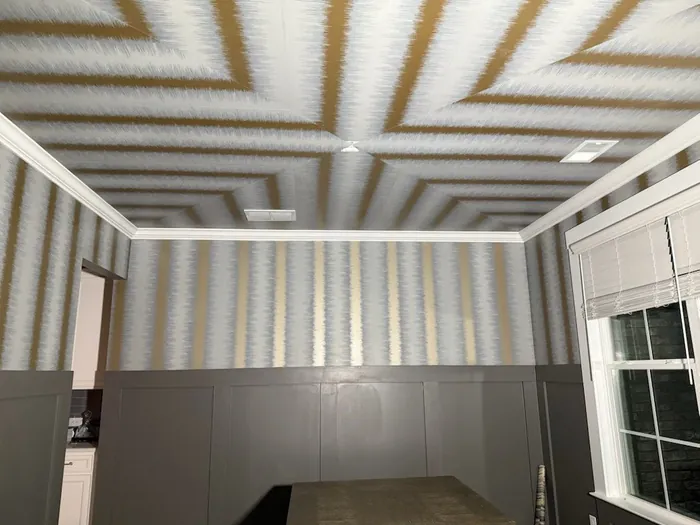 Room with a striped wallpaper continued across the ceiling in a nested square pattern